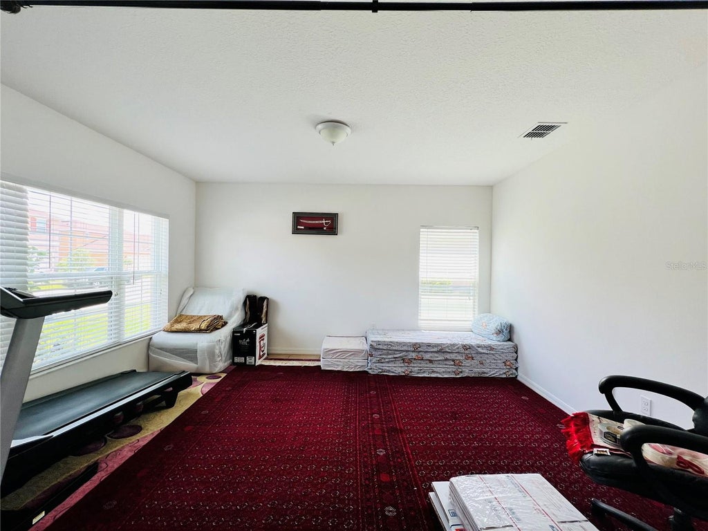 Photo of 4969 Whistling Wind Avenue, Kissimmee, FL 34758 (MLS # O6433656)