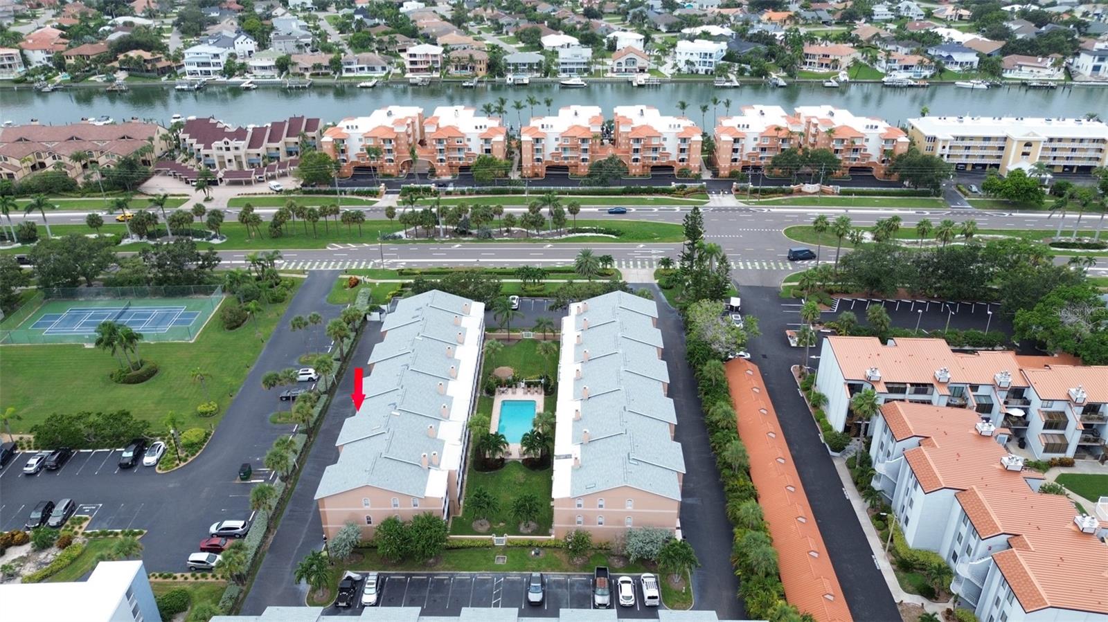 PRICED TO SELL! The best priced /square foot townhome on the island of Tierra Verde! Brand new 2025 roof AND flood insurance is included in HOA dues! This RENOVATION READY 2 bed / 2.5 bath townhome is awaiting your personal touches, bring your vision to life.Â
The main level offers an open concept floor plan, spacious kitchen with ample cabinet space, dining/living room combo with a wood burning fire place and sliders to balcony overlooking the pool area. The upstairs bedroom level offers vaulted ceilings with skylight, a large primary with ensuite bath and its own balcony. Second bedroom has a full bath with shower. The hall features a laundry closet with additional storage. The garage level offers one parking space (easily converted to 2), workshop/storage and a bonus / flex room with access to rear patio and pool area. Flood insurance, Spectrum high speed internet and two cable boxes are included in monthly HOA payment. Gorgeous, expansive pool area with tropical landscaping. Palm Island is a pet friendly waterfront townhome community. Located just a few minutes to I-275, St. Pete Beach, 30 min. to Tampa International Airport; close to shopping, restaurants and just 15 minutes to downtown St. Pete. Tierra Verde has a community park, baseball field, tennis & pickleball courts, playground, biking and running trails. Two marinas, several restaurants and local shops are all within a short walk. Recreation and adventure await at nearby Fort DeSoto! Enjoy the beach along with fishing, camping, kayaking, paddle boarding and the dog beach and dog park. Schedule your private showing today.