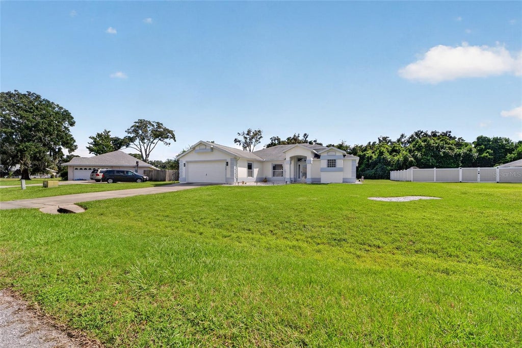 Photo of 7558 SW 103rd Loop, Ocala, FL 34476 (MLS # OM734054)