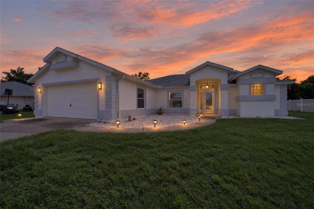 Photo of 7558 SW 103rd Loop, Ocala, FL 34476 (MLS # OM734054)