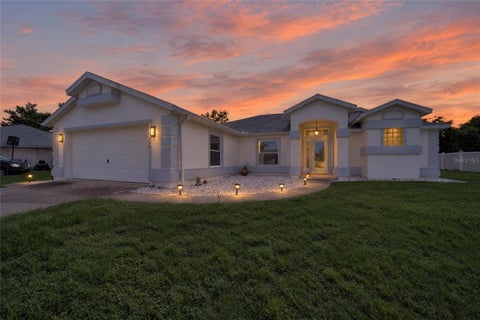 Photo of 7558 SW 103rd Loop, Ocala, FL 34476 (MLS # OM734054)