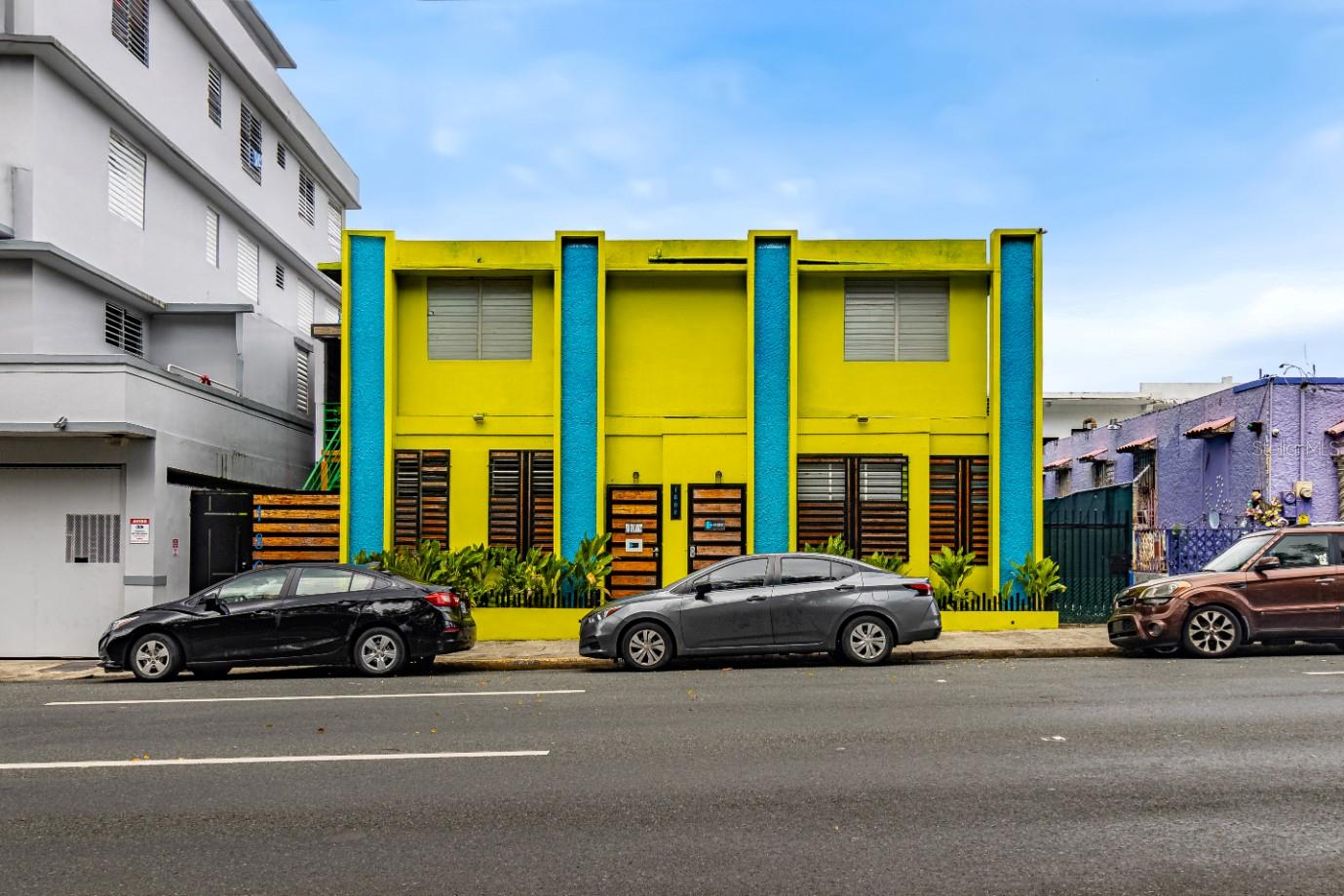 Unique commercial property located on Fernández Juncos Avenue in Santurce, San Juan. This two-story concrete building offers approximately 3,100 square feet of construction on a 3,203 square foot lot (0.07 acres) within the ZU-G2 Urban General zoning district, allowing for mixed-use development such as hospitality, offices, or residential units.
The property is currently operating as a hostel, featuring 7 rooms, shared dormitory-style accommodations, a reception area, kitchen, dining room, laundry area, and three half bathrooms. The structure is in good condition.
Located in one of San Juan’s most dynamic corridors, near Miramar, Sagrado Corazón University, and the Convention District. This asset offers excellent accessibility, visibility, and future redevelopment potential. Zoning ZU-G2 permits a wide range of commercial and residential uses.
