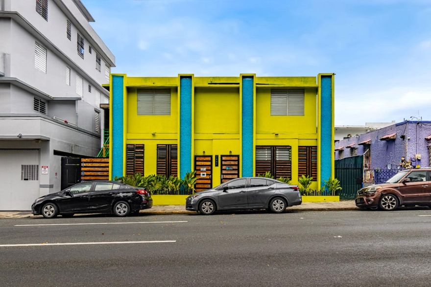 Unique commercial property located on Fernández Juncos Avenue in Santurce, San Juan. This two-story concrete building offers approximately 3,100 square feet of construction on a 3,203 square foot lot (0.07 acres) within the ZU-G2 Urban General zoning district, allowing for mixed-use development such as hospitality, offices, or residential units.
The property is currently operating as a hostel, featuring 7 rooms, shared dormitory-style accommodations, a reception area, kitchen, dining room, laundry area, and three half bathrooms. The structure is in good condition.
Located in one of San Juan’s most dynamic corridors, near Miramar, Sagrado Corazón University, and the Convention District. This asset offers excellent accessibility, visibility, and future redevelopment potential. Zoning ZU-G2 permits a wide range of commercial and residential uses.