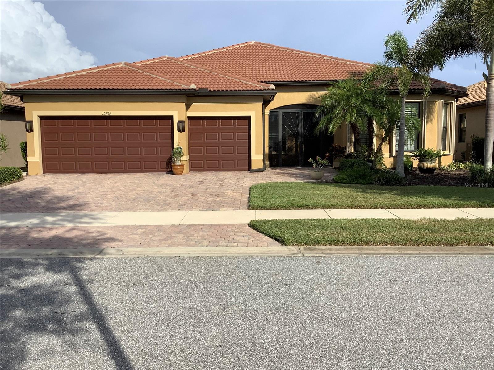 MOTIVATED SELLER!!
Looking for the “Florida Resort Lifestyle?” Look no further than 19696 Petrino St., a 2516 sq.ft. Pinnacle Estate Model. This is a sought after model built by Pulte/DiVosta in beautiful IslandWalk located in Wellen Park. The open floor plan boasts simple elegance from its Southern pine ceilings in the entry way and on the lanai to the custom cork wall in the gathering room to the Plantation shutters throughout. The Pinnacle is a 3 bedroom 3 bath, (2 of which are en-suite) home with a den/study. The bedrooms and den have engineered hardwood floors and the remainder of the home porcelain tile set on the diagonal. The homes roof was recently cleaned and sealed with a 5 year transferable warranty, August 05,2025. The home comes with a 3 car garage with overhead storage, brand new 50 gallon high efficiency water heater, July 2025, full house 500 gallon 22 KW Generac generator, StormSmart shutters on the lanai with Eurex accordion shutters on the windows, 3 zone 17 seer air conditioner and a heated swimming pool with Traverine tile lanai. The kitchen comes with brand new,May 2025 KitchenAid oven and microwave,stainless steel appliances, quartz counter tops, recessed dimmable lighting and remote controlled fans. The exterior of the home has 2 separate low voltage exterior lighting systems to enhance the beauty and appeal of this home.
The community is an active lifestyle community comprising of 2 resort centers with 2 pools, 2 lap pools, pickle ball, tennis, basket ball, bocce courts, 2 state of the art gyms, yoga studios, library, card rooms,walking/biking trails and bridges, dog park, and community gardens. The community center hosts fashion shows, comedy shows, concerts and food trucks.
Your new home is a stones throw from Cool Today Ball Park, Wellen Park Farmers market held on Sunday mornings and Thursday evenings as well as restaurants and clothing stores, there is also a Publix market near-by. Wellen Park is in the Top 10 growing thriving communities in the country. Make it YOUR home!