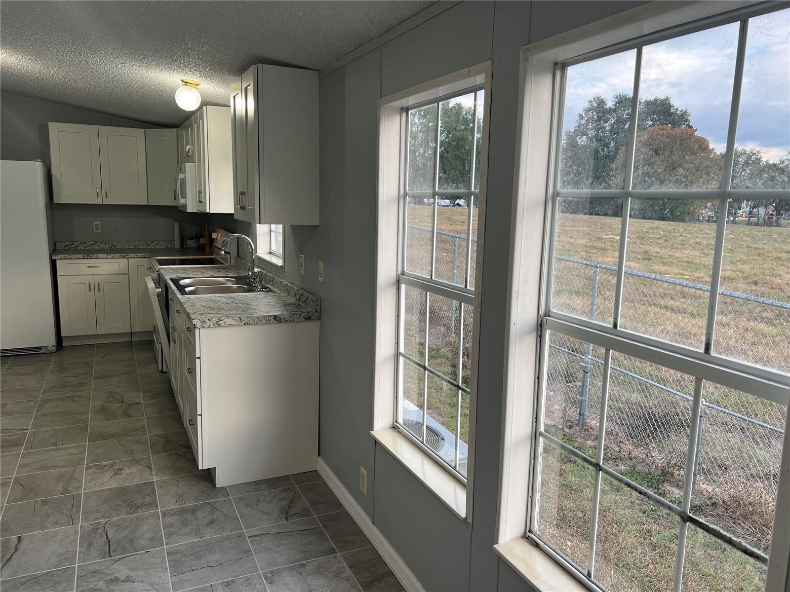 HILL N DALE THE VILLAGE - Residential