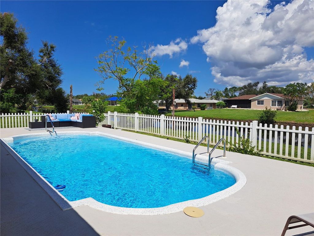 Photo of 231 Caddy Road, Rotonda West, FL 33947 (MLS # C7524452)