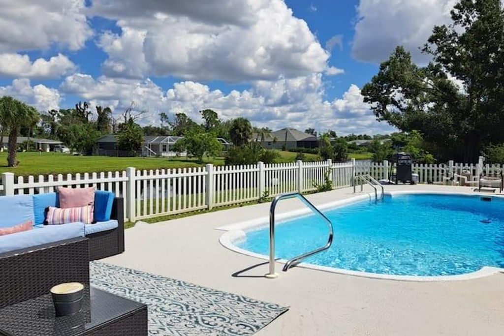 Photo of 231 Caddy Road, Rotonda West, FL 33947 (MLS # C7524452)