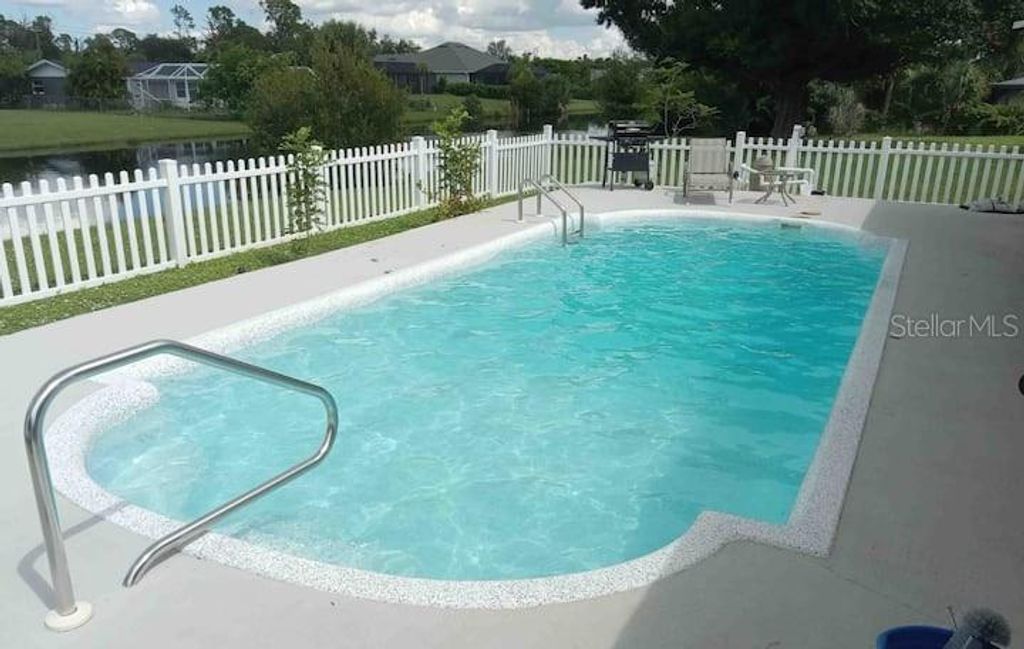 Photo of 231 Caddy Road, Rotonda West, FL 33947 (MLS # C7524452)