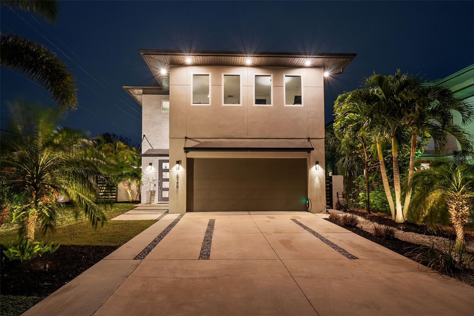 $70,000 Price Reduction! Own More For Less! Why go elsewhere when you can move right into a fully upgraded, better-than-new masterpiece designed for the way you really live? Welcome to this stunning 4-bedroom, 2.5-bath home by Majestik Homes—a builder known for blending timeless craftsmanship with contemporary flair. Set on a larger, meticulously landscaped corner lot, this residence offers nearly 2,900 SQFT of elevated living where every detail feels intentional, every upgrade feels essential, and every space invites you to stay a while. From the curb, this home commands attention with custom lighting, a widened driveway, and a 50-amp EV charger—all setting the tone for the smart, stylish features waiting inside. Step through the front door and into a flowing, open-concept layout made for entertaining, with finished concrete & oak wood floors, hurricane windows, and an abundance of natural light. The chef’s kitchen is pure artistry— waterfall-edge island, two-tone cabinetry, upgraded appliances, and a dramatic herringbone backsplash. It opens effortlessly to a sun-drenched living and dining space that transitions beautifully to the outdoors. And oh, the outdoors—this backyard is a full-on Florida fantasy. Picture evenings under the string lights, alfresco dinners on the covered patio with custom shades, and lazy weekends floating in your solar-heated saltwater pool, surrounded by lush privacy landscaping and maintenance-free turf. Upstairs, tranquility continues in the primary suite, where you’ll wake to pool views and unwind on your private balcony. The spa-worthy bath with floating vanities and glass shower feels like a luxury retreat, while the versatile loft and generous guest rooms make this home work as beautifully as it lives. Add in smart home tech, whole-house filtration, enhanced concrete work, and one of Sarasota’s top school zones—all just minutes to Siesta Key Beach and Downtown—and you’ve got a rare blend of sophistication, comfort, and value. Better than new. Priced to move. Designed to impress. Schedule your private tour today!
