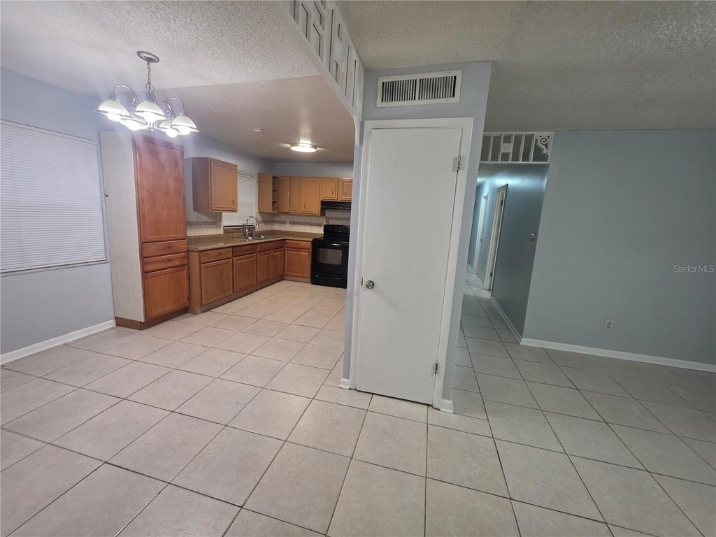 Photo of 1211 Poppy Avenue, Orlando, FL 32811 (MLS # O6453274)