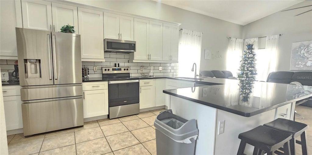 Photo of 179 Emeraldview Avenue, Davenport, FL 33897 (MLS # O6437632)