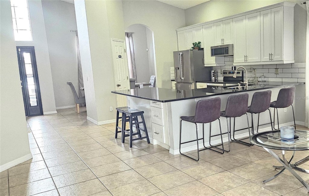 Photo of 179 Emeraldview Avenue, Davenport, FL 33897 (MLS # O6437632)