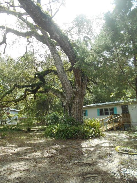 Photo of 20425 NE 143rd Street, Fort Mccoy, FL 32134 (MLS # OM710940)