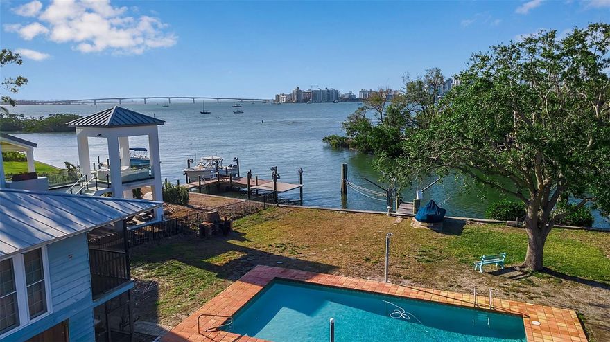 Being in the same family for 75 years, this is a rare opportunity to own a stunning, nearly half-acre waterfront lot in the highly desirable Bay Point Park neighborhood of Sarasota. Situated on protected sailboat water with no bridges to the Gulf of Mexico, this unique property offers unparalleled access to the serene waters of Sarasota Bay, with breathtaking views of the iconic Ringling Bridge and the vibrant downtown Sarasota skyline.  Enjoy a truly walkable lifestyle with the best of Sarasota at your doorstep. Stroll to Marie Selby Botanical Gardens, the charming shops and gourmet restaurants of downtown, the quaint Southside Village, and the renowned Morton's Gourmet Market—all just moments away. Tucked away in a tropical oasis, this secluded lot offers privacy, tranquility and convenience, providing the perfect setting for a custom-built home with sweeping waterfront views. Located in one of the most sought-after West of the Trail neighborhoods, this large waterfront parcel presents a unique opportunity to create a luxurious sanctuary in one of Sarasota's most coveted locations. Whether you’re an avid sailor or simply appreciate the beauty of coastal living, this property is your perfect canvas.  Don’t miss the chance build your dream home on this exceptional slice of Sarasota paradise—where the natural beauty, luxury, and lifestyle you’ve always dreamed of can finally become a reality.