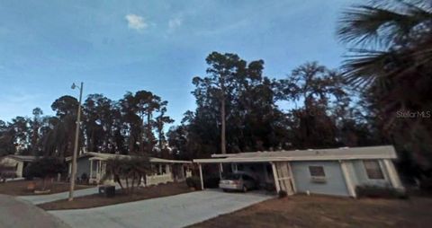 Photo of 2808 Manatee Road, Tavares, FL 32778 (MLS # O6312497)