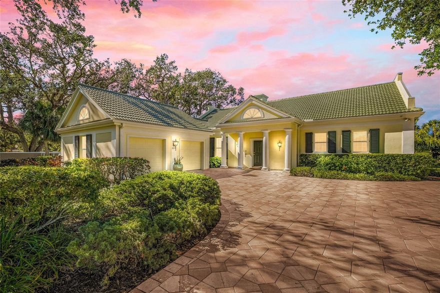 **TURNKEY FURNISHED, ELEGANT and TRADITIONAL ESTATE by Famed Architect, Bo MacEwen, on the Single Largest 0.32 Acre Cul De Sac Lot in the Popular SAINT JAMES PARK neighborhood in The Oaks Country Club.  NEW ROOF (2024), HURRICANE IMPACT WINDOWS and SLIDING DOORS, FLOOD ZONE “X500”. Overlooking the Eagle Golf Course and Ideally Located near the Clubhouse and Campus of World Class Amenities, this Distinctive LIGHT AND BRIGHT floorplan offers 2-BEDS, 2 FULL BATHS, 2-Car Oversized Garage with EV Charging and features unique architectural details throughout including beautiful crown moldings, wainscoting, cozy fireplace, engineered hardwood and tile floors, built-in sound system, and More!  A nicely equipped kitchen features hardwood cabinets and stainless steel appliances while the Spacious bedrooms include a primary bedroom suite with walk-in closet, dual vanities, soaking tub and custom-tiled shower.  In addition to its wonderful curb appeal and beautifully manicured landscape, a Spacious and screened lanai offers Gorgeous Sunset Views with its ideal Western Exposure. THE OAKS is a distinguished, 24hr Guarded, Country Club Community which boasts many accolades including: Platinum Club of America, Emerald Club of the World, Elite Distinguished Club of the World and One of America’s Healthiest Clubs - where amenities include Three Restaurants, Ballroom, Two 18-hole championship GOLF courses, award-winning RACQUETS program with 12 Har-Tru Hydro-Grid TENNIS courts, 4 PICKLEBALL Courts, wonderful CROQUET facility, state-of-the-art FITNESS center and junior Olympic, heated community SWIMMING POOL, Bocce, Basketball Court, Playground and more! The Oaks is just minutes from nationally ranked Pine View School, the Legacy Bike Trail, area Beaches and all that Gulf Coast living has to offer. Membership is required and there is NO WAITLIST for GOLF or SOCIAL Membership.