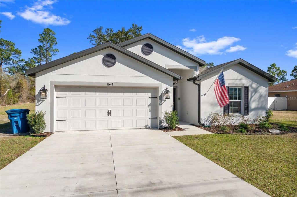 Photo of 11014 Golden Warlber Rd, Brooksville, FL 34613 (MLS # W7882609)