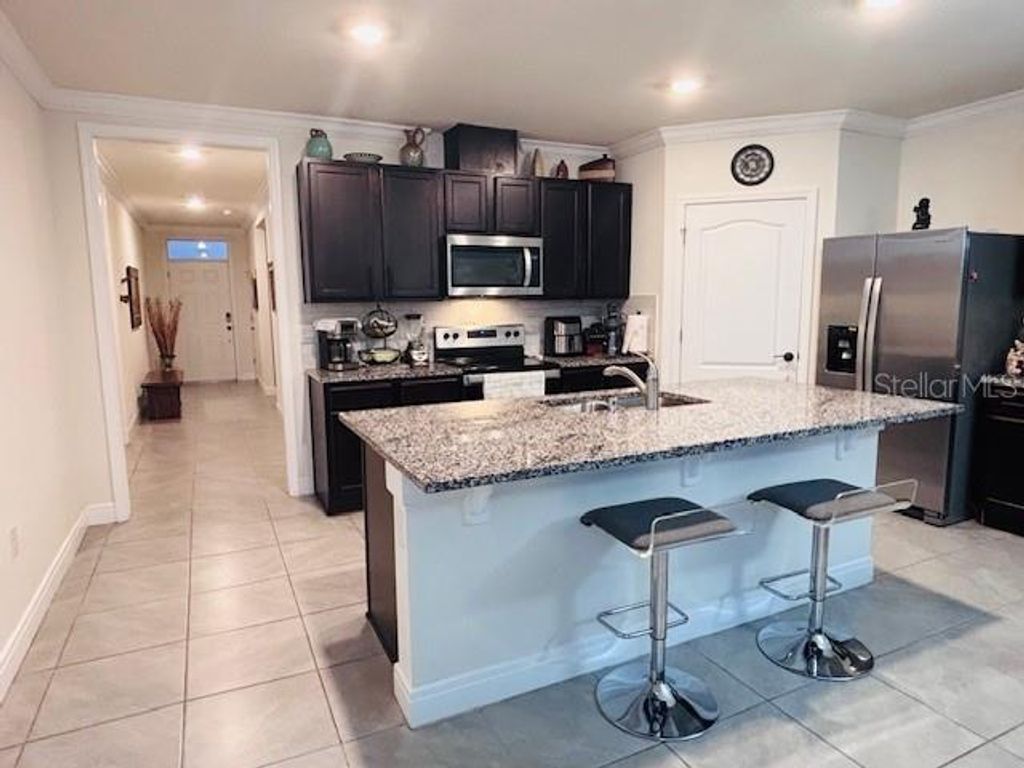 Photo of 5077 Barombi Bend, Saint Cloud, FL 34772 (MLS # O6391571)