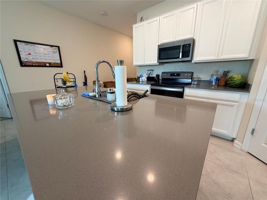 Photo of 16419 Glassy Loch Loop, Clermont, FL 34714 (MLS # TB8506992)