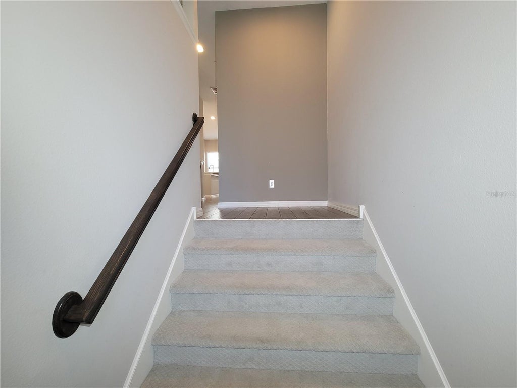 Photo of 56 Boardwalk Avenue, Oviedo, FL 32765 (MLS # O6449679)