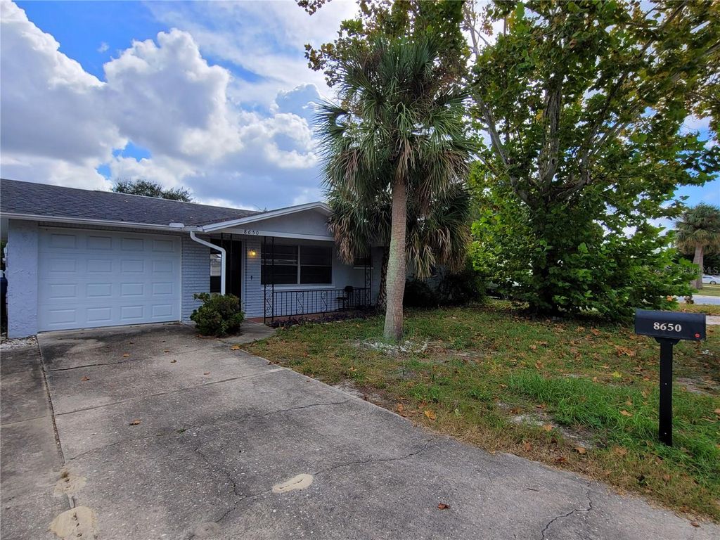Photo of 8650 Robilina Road, Port Richey, FL 34668 (MLS # TB8499879)