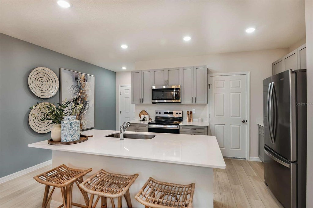 Photo of 4254 Hillock Boulevard, Haines City, FL 33844 (MLS # TB8520125)