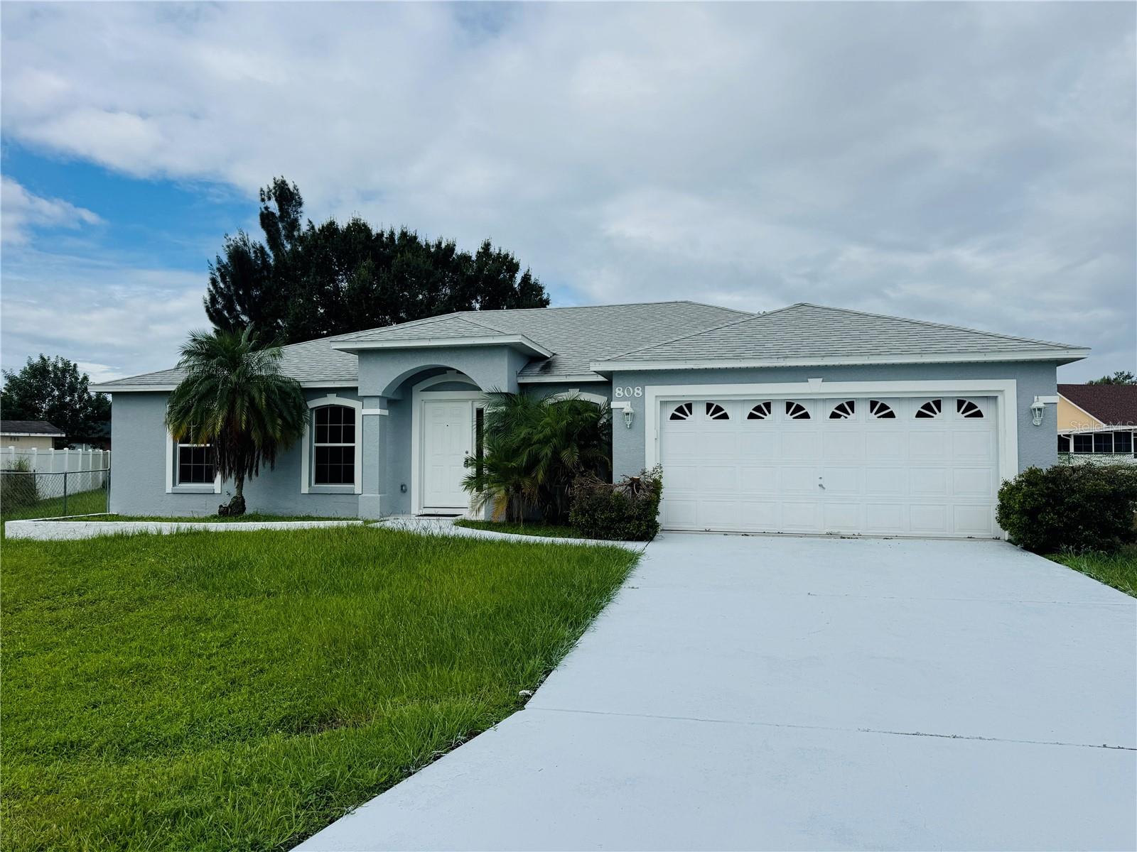 This beautiful spacious home has an excellent floor plan, it has a formal dining room, kitchen family room combo, 4 split bedrooms with carpet, glossy ceramic tiles in the common areas. It also features a large fenced in yard and NEW ROOF. Must see to appreciate.