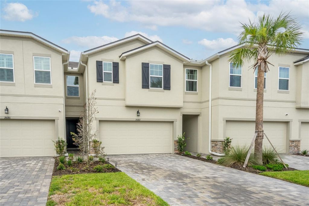 Photo of 26082 Woven Wicker Bend, Lutz, FL 33559 (MLS # TB8396222)