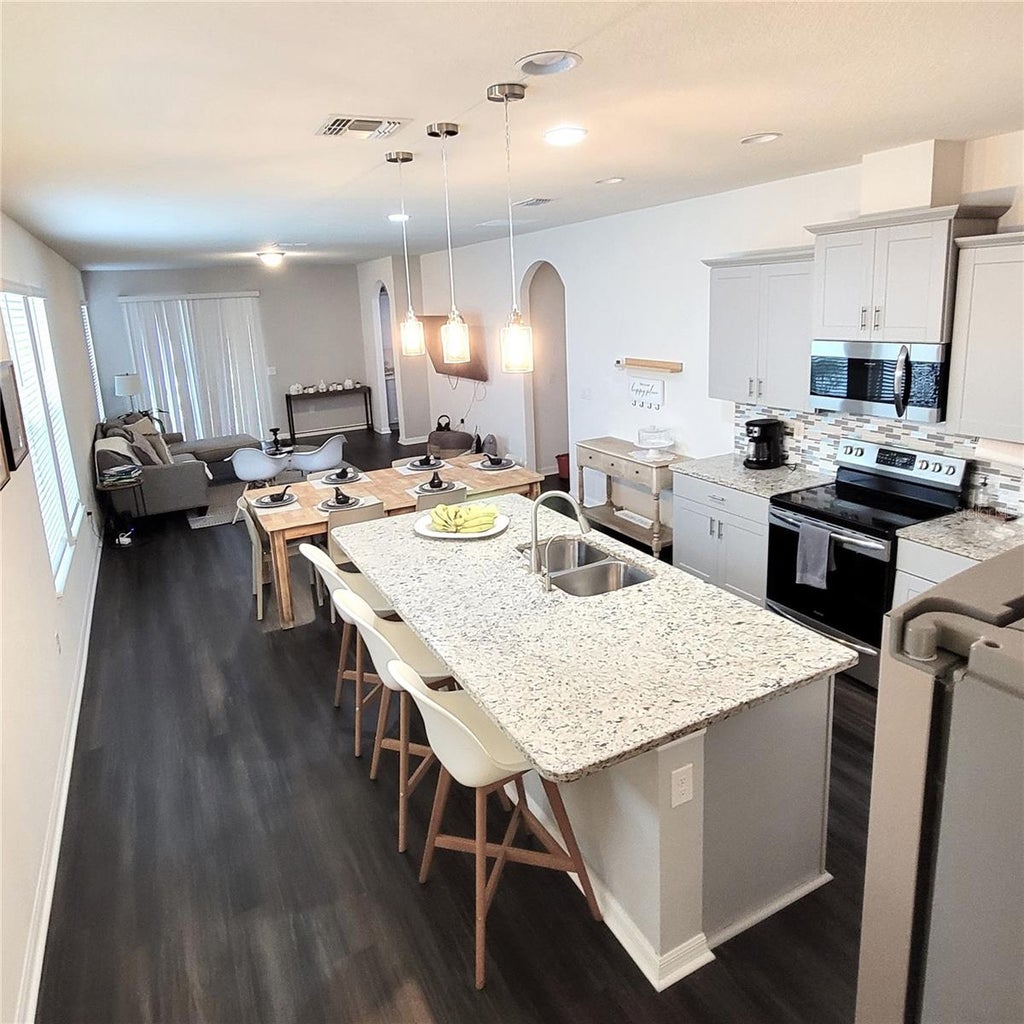 Photo of 9456 Komika Lane, Winter Garden, FL 34787 (MLS # S5156916)