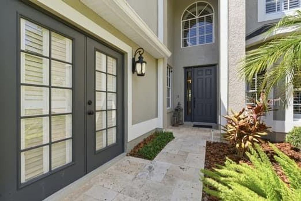 Photo of 18901 Saint Laurent Drive, Lutz, FL 33558 (MLS # TB8509536)