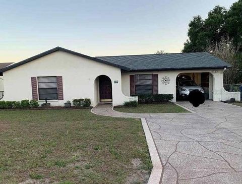 Photo of 7170 Lexington Circle, Brooksville, FL 34602 (MLS # TB8471714)