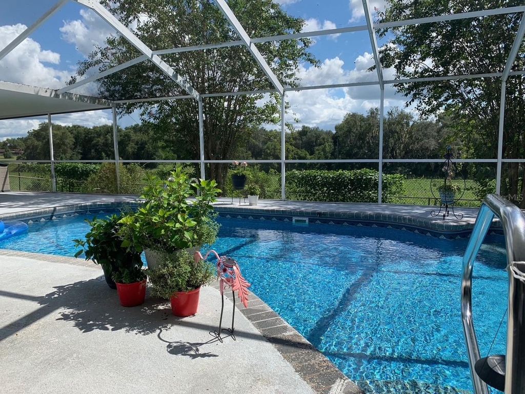 Photo of 7170 Lexington Circle, Brooksville, FL 34602 (MLS # TB8471714)