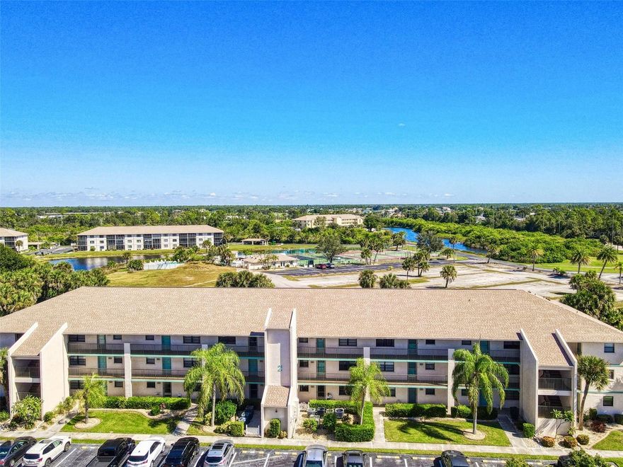 Pride of ownership shows in this well- kept MOVE-IN READY second floor 2-bedroom, 2-bath TURNKEY Condo, located in the desirable Newport Condominium community.  This FURNISHED condo is complete with the convenience of access to an ELEVATOR.   The spacious primary suite features a large walk-in closet and a private bath with a walk-in shower. The guest bedroom is ideal for family or visitors, with a nearby full bath including a tub. The kitchen offers GE appliances—refrigerator, dishwasher, microwave, and disposal—and the in-unit laundry room adds convenience with a washer, dryer, and extra storage. Enjoy peaceful views of the tennis courts, pool, and lake from your screened balcony—perfect for watching beautiful Florida sunsets. Newport Condominium is ideally located close to shopping, dining, and entertainment at Port Charlotte Town Center Mall, with quick access to Englewood Beach, Boca Grande, and Charlotte Harbor for boating, fishing, and waterfront dining. Golf courses, parks, and nature trails are nearby, along with medical facilities and everyday essentials. Easy access to I-75 makes travel to Sarasota, Fort Myers, or Naples a breeze. This well-cared-for condo offers the perfect combination of comfort, location, and convenience—A MUST SEE!
