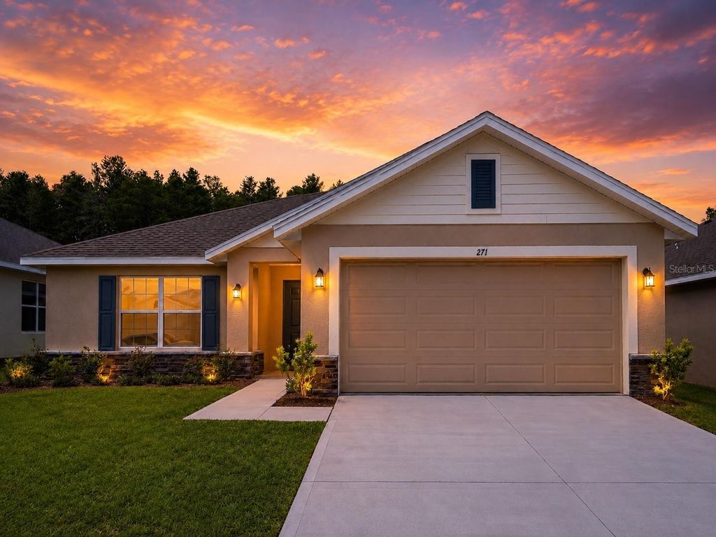 Photo of 1671 Ann Rose Way, Leesburg, FL 34748 (MLS # O6423135)