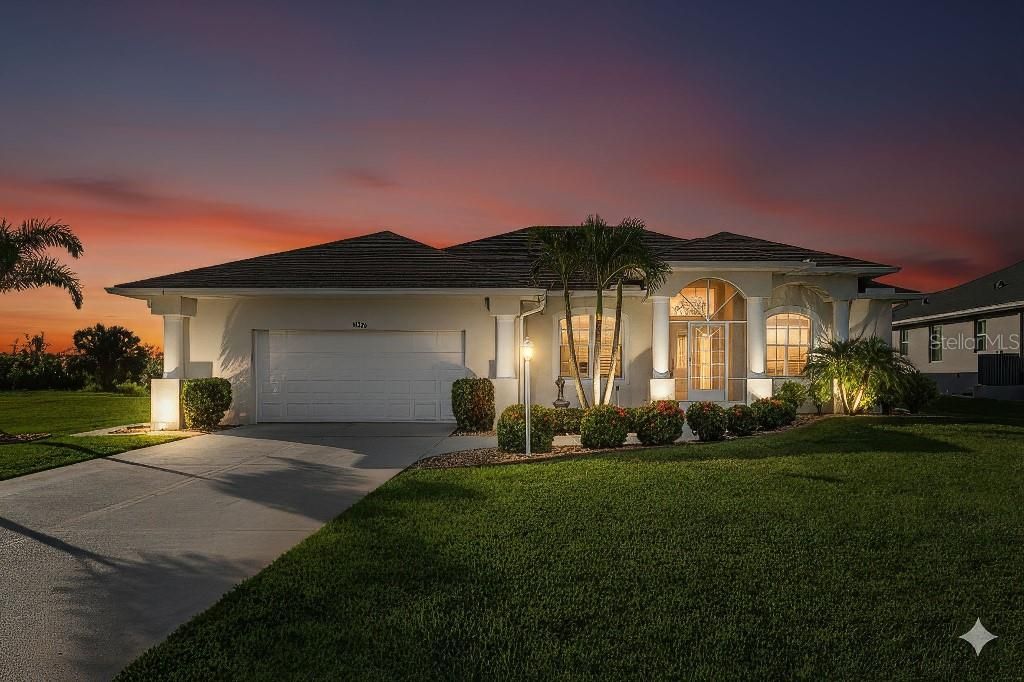 Photo of 15626 Meacham Circle, Port Charlotte, FL 33981 (MLS # TB8436763)