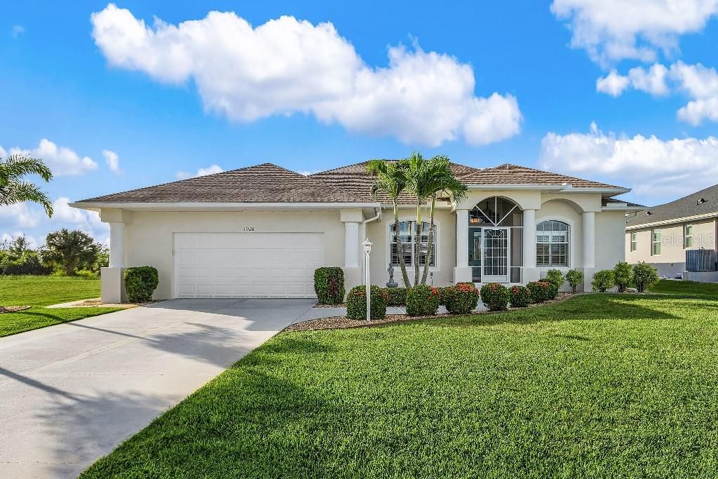 Photo of 15626 Meacham Circle, Port Charlotte, FL 33981 (MLS # TB8436763)