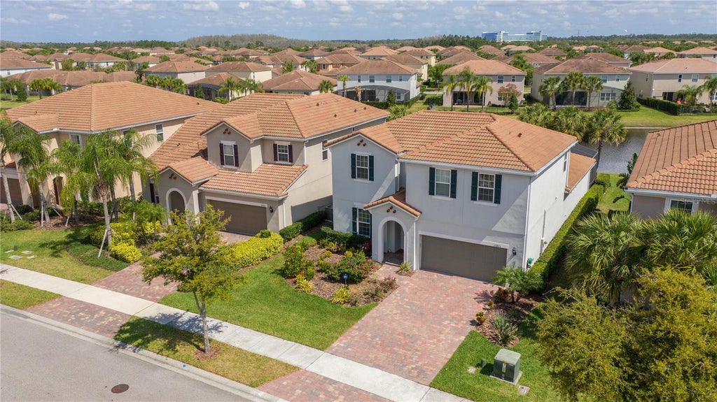 Photo of 12071 Uleta Lane, Orlando, FL 32827 (MLS # O6447856)