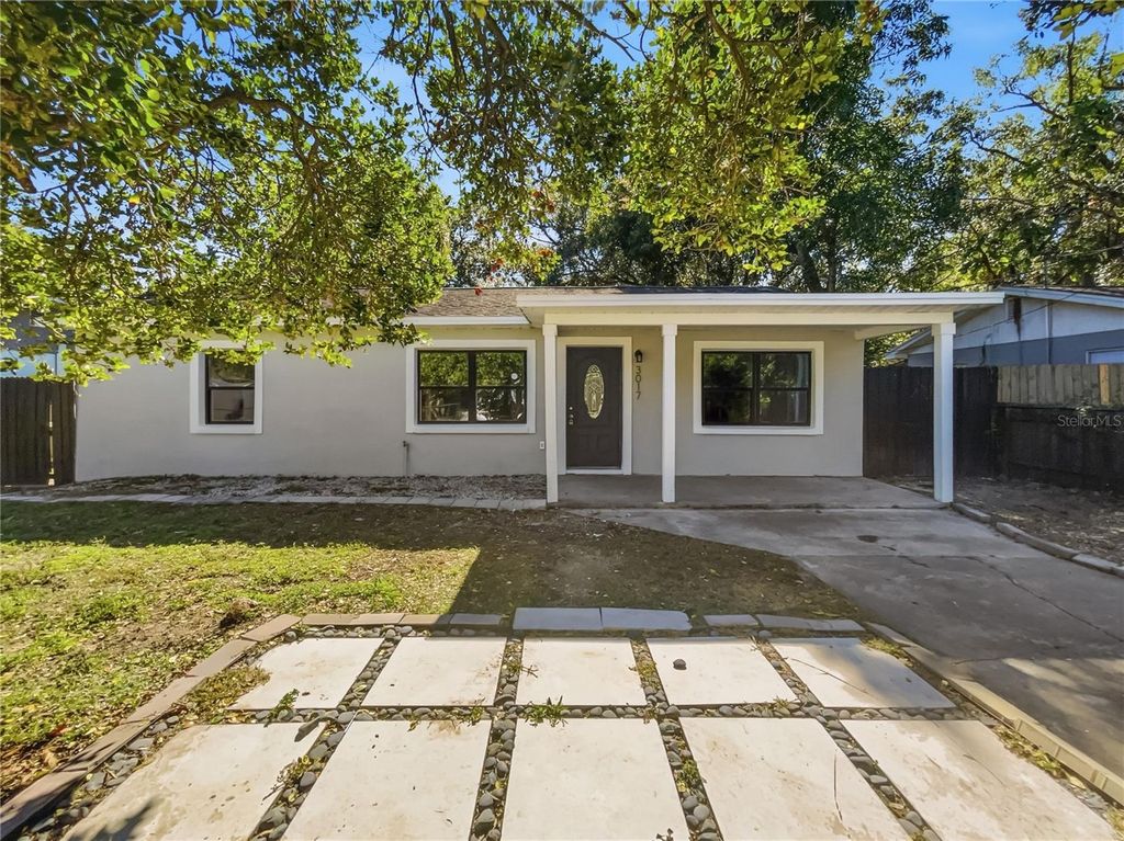 Photo of 3017 E Idlewild Avenue, Tampa, FL 33610 (MLS # O6375594)