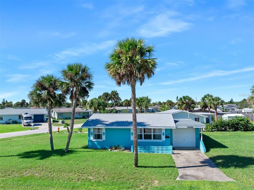 Charming Furnished Beach Cottage in Ormond-by-the-Sea, Move In Ready. Discover coastal living at its best in this furnished 2-bedroom, 1-bath beach cottage located in the heart of Ormond-by-the-Sea. Just a short stroll from the beach, this block home combines comfort, convenience, and coastal charm. Step inside to find a bright, open living area filled with natural light, and everything you need to move right in. The updated kitchen features modern appliances, plenty of cabinet space, and a cozy dining area — indoor laundry room, and a garage, perfect for casual seaside living. Enjoy two comfortable bedrooms, a full bath, a spacious Florida room, a big corner lot, ideal for relaxing after a day at the beach, or parking your toys. This home features new windows installed in 2011, an upgraded heat pump system installed in 2014, fresh exterior paint completed in 2024, and a brand-new roof also installed in 2024.