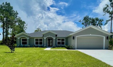 Photo of 16 Sea Shark Path, Palm Coast, FL 32164 (MLS # FC310186)