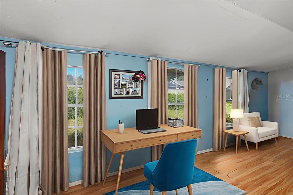 Photo of 1432 Windmill Pointe Road, Palm Harbor, FL 34685 (MLS # TB8450194)