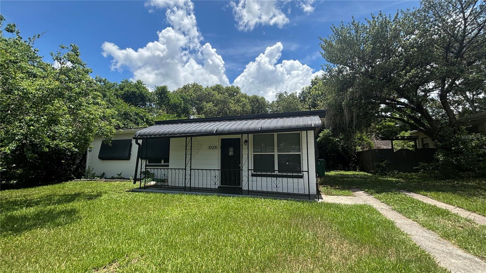 Cute, recently renovated home in Zephyrhills. 3 bedrooms, 1 bath. Over 1000 sq/ft of living space. Kitchen has granite counters and newer appliances. Newer flooring and paint throughout, screened porch and spacious back yard. This home is sure to go quick so call today! One or more photo(s) was virtually staged.
