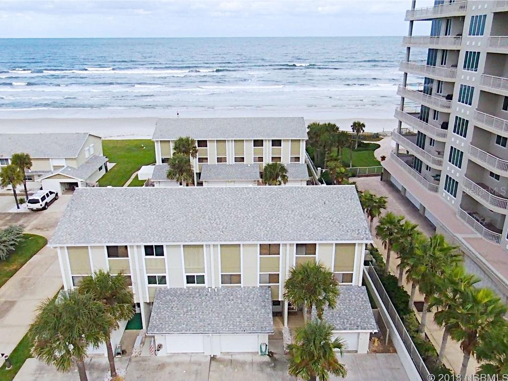 This is a one of a kind beach-side Townhouse and is ready for you with great ocean views from the living room and bedroom. This is a 2 bedroom, 2 and half bathrooms. Both bedrooms have attached bathrooms. Relax on your couch and have great views of the ocean. Updated kitchen with granite counter tops, white cabinets and eat in kitchen. Updated bathrooms as well. One car garage with two parking spaces for all your beach toys and a big laundry room. Big community pool that over looks the ocean. What else would you need! ;Water: City