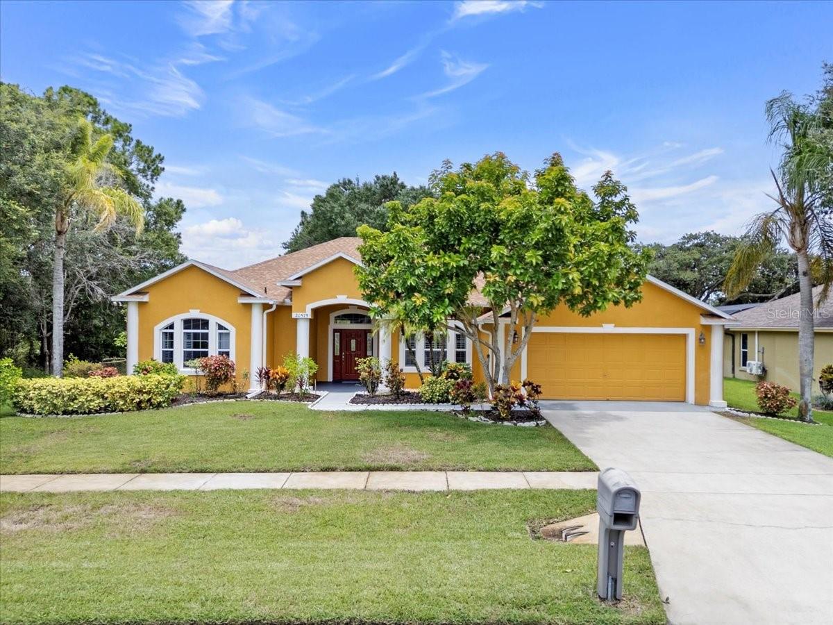 Tucked inside the quiet Wedgefield golf community, this home is spacious and offers flexible living space with **no rear neighbors** and a peaceful backyard surrounded by fruit trees. The split floor plan offers ideal privacy, with the primary suite on one side of the home and the **secondary bedrooms tucked away on the opposite side**, creating a comfortable space for guests, kids, or multigenerational living. There’s also a bonus room perfect for a home office, playroom, or gym.
The third bathroom is perfectly positioned with backyard access, making it ideal for entertaining outdoors or adding a future pool. Enjoy indoor-outdoor living with a screened lanai, built-in speakers, and a kitchen designed for hosting—featuring granite counters, maple cabinets, and an oversized island.
Enjoy indoor-outdoor living with a screened lanai and an open kitchen designed for hosting...featuring granite counters, maple cabinets, and an oversized island. Major updates include a **new roof (2023)** and **new AC (2020)** for comfort and peace of mind.
You’ll love the location...just a short drive to Downtown Orlando, the Orlando International Airport (OIA), UCF, Lake Nona Medical City, and Cocoa Beach. This home offers space, privacy, and easy access to the best of Central Florida.
.