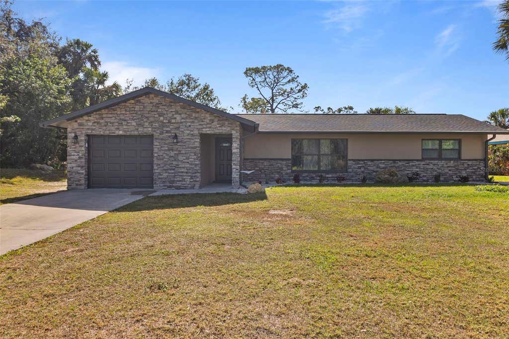 Photo of 20495 Albury Drive, Port Charlotte, FL 33952 (MLS # O6432486)