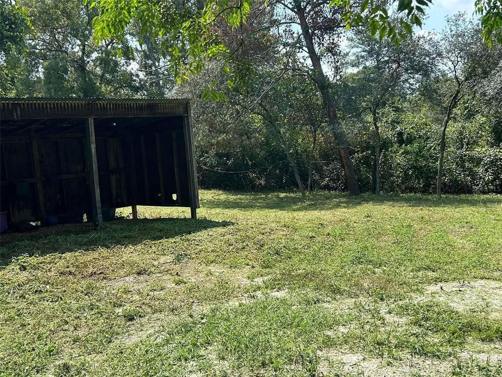 Photo of 31304 Hillside Drive, Deland, FL 32720 (MLS # O6432560)