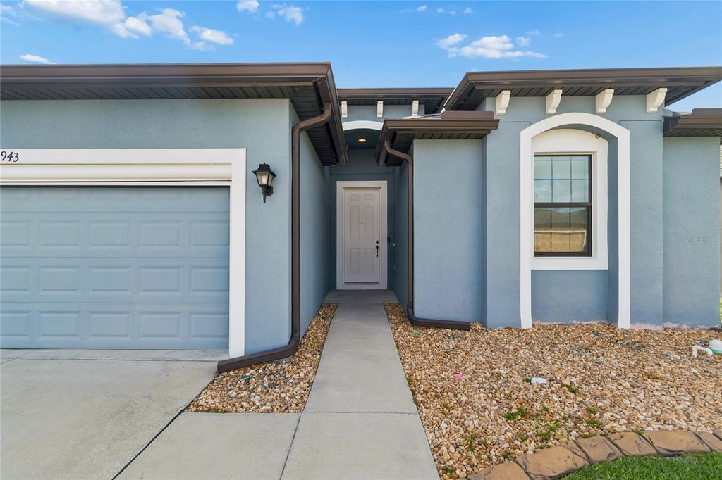 Photo of 943 Old Windsor Way, Spring Hill, FL 34609 (MLS # TB8519128)