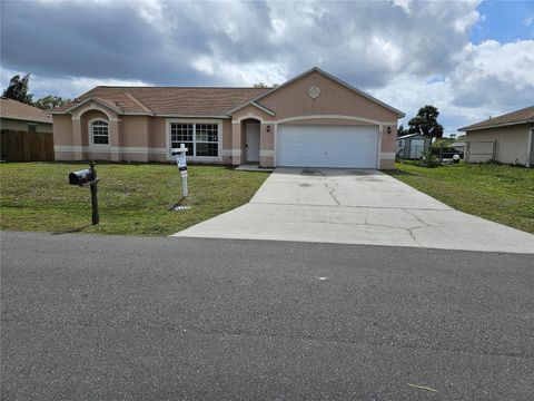 Photo of 570 Ontario Street NW, Palm Bay, FL 32907 (MLS # O6347376)