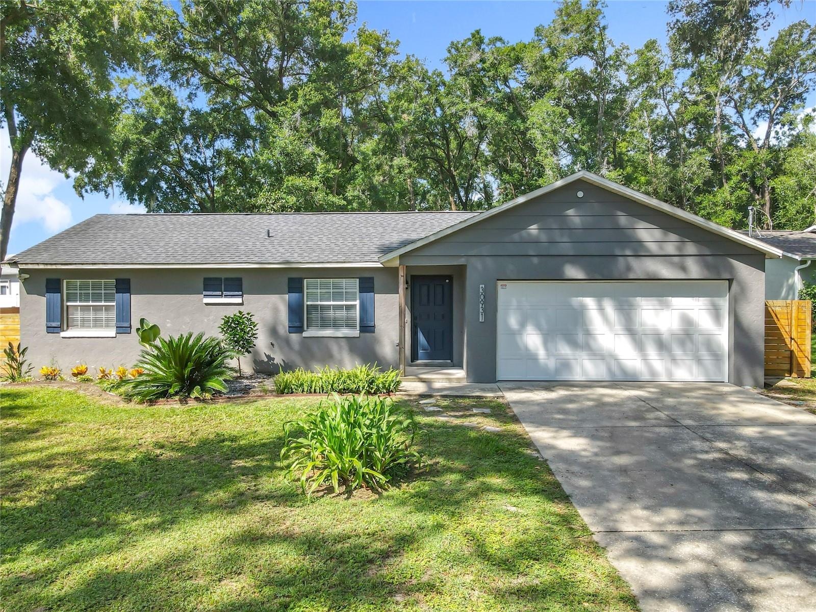 Come see this Sorrento home that is ready for you to add your personal touches. Located in a golf cart community with no HOA. This is a 3/2 split plan home with a 2-car garage. New roof in February of 2018. New AC in 2021, new wood fence in 2022. New water heater, washer and dryer. No pop corn ceilings throughout the house, ceiling fans in living room, family room, and all the bedrooms. Large master bedroom, master bath has a soaking tub. This home is ready immediately. Close to SR 429 for an easy commute to Orlando, Maitland, or the Theme Parks and a short drive to Historical Downtown Mt. Dora. You won't find a better deal.