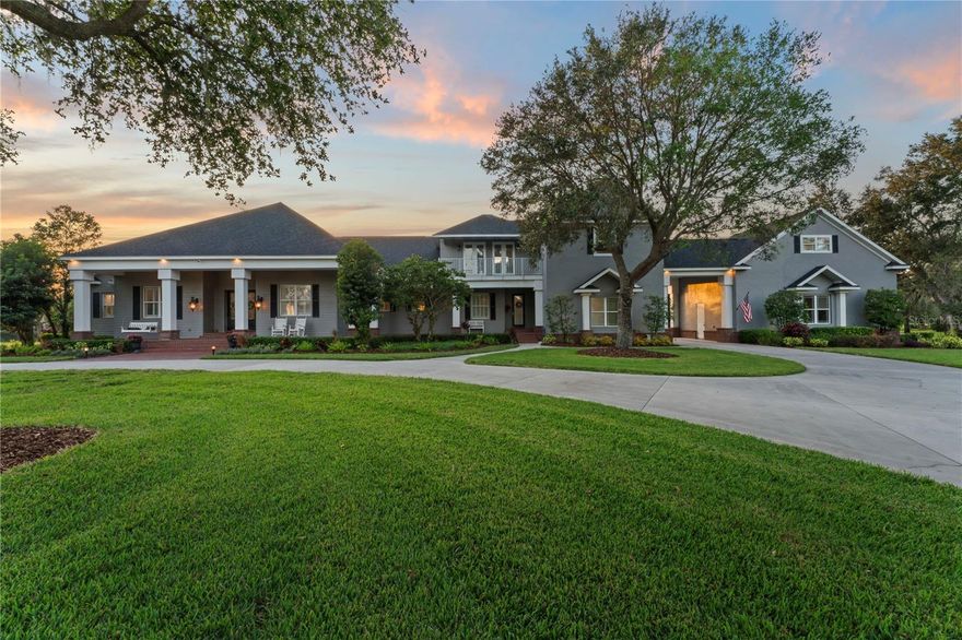 Entertainer's Paradise awaits. Extraordinary opportunity to live in one of Lithia’s most distinguished gated communities, offering ample space, serenity, and a connection to nature. This custom-designed, fully renovated estate sits on a breathtaking 5-acre lot with no rear neighbors with an additional five-acre stretch of protected land behind you. A long tree-lined circular driveway welcomes you home, with a newer roof adding both charm and peace of mind. Step inside and discover a layout designed to embrace functionality.  Spacious great room, where oversized windows fill the space with natural light and frame the view of the inviting pool and outdoor living area. Crown molding, refined finishes, and rich new flooring throughout enhance the warmth of each space. The formal dining room provides the perfect setting for gatherings or dinner parties. The kitchen offers the function and style every home chef desires. Sleek granite countertops, plenty of wood cabinetry, stainless steel appliances, and dual ovens make preparing meals a delight. A sunny breakfast nook, creating a cozy spot to enjoy morning coffee or casual meals. A large walk-in pantry and breakfast bar with seating add convenience.
All five bedrooms are located on the main floor, each one generously proportioned. Four of the bedrooms include private, en-suite bathrooms—perfect for multigenerational living, hosting guests, or simply enjoying added privacy. The primary suite is a quiet retreat and features serene views of the pool area, private access to the lanai, and a beautifully appointed en-suite bath complete with two vanities, a large soaking tub, and a spacious walk-in shower. Two walk-in closets offer ample storage, while a private home office connected provides a quiet space for remote work.
Upstairs, the second level offers flexible living space with a bonus loft and an oversized bonus room with balcony—perfect for a game room, media center, playroom, or even a sixth bedroom if needed.
Outside, the lifestyle continues in a private oasis designed for effortless outdoor living and entertaining. The pool area was recently refinished in 2024 and offers ample space for lounging in the sun, outdoor dining, and evening gatherings. An impressive outdoor kitchen and grilling area, redesigned in 2025, is paired with an outdoor fireplace that brings warmth and ambiance to cool Florida evenings. The expansive yard offers a tranquil backdrop of mature trees and lush greenery, with a designated area perfect for a firepit. The property also welcomes Florida wildlife, offering opportunities to observe deer, birds, and more in your own backyard.
Practical features enhance the appeal even further—there’s an oversized laundry room with additional cabinetry, a spacious garage with epoxy flooring, and a large storage area above the garage. Recent updates include a new HVAC system (main house) and water heater, both replaced just two years ago, as well as new paint, new flooring throughout, and beautifully renovated bathrooms and kitchen that elevate every corner of the home.
This home is more than just a place to live—it’s a private estate designed to offer a lifestyle of comfort, privacy, and elegance, all within a community that values space and serenity. Located just 30 minutes from downtown Tampa and within convenient reach of shopping, dining, equestrian centers, and excellent schools, this is a rare opportunity to enjoy Florida living in a tranquil and natural setting.